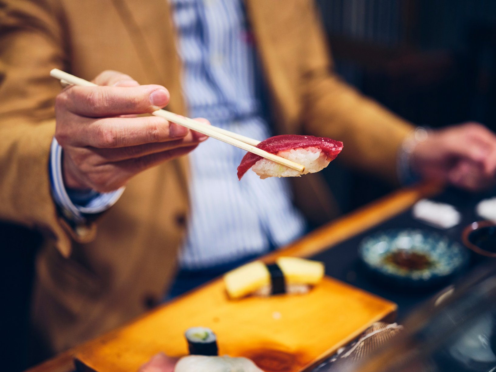 Japanese Sushi Chef in a Sushi Shop